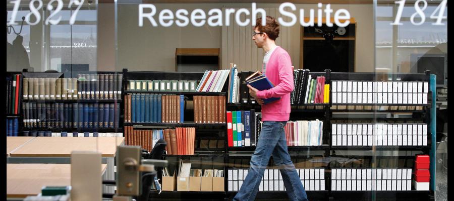 A student in the Research Suite of the Main Library.