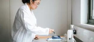 student in a science lab