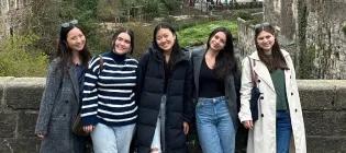 IFP students smiling together on bridge