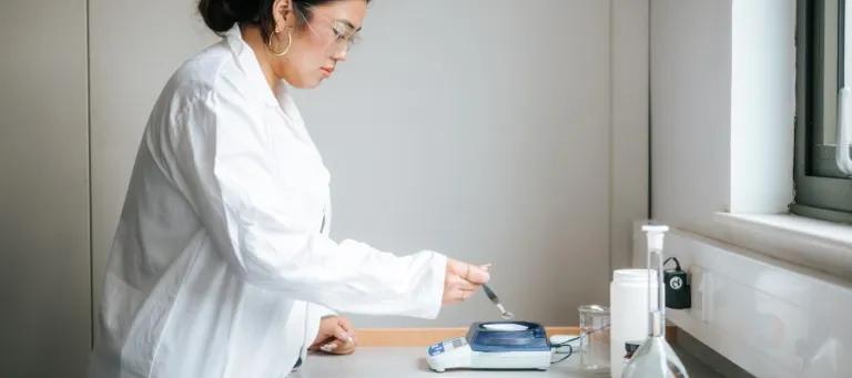 student in a science lab
