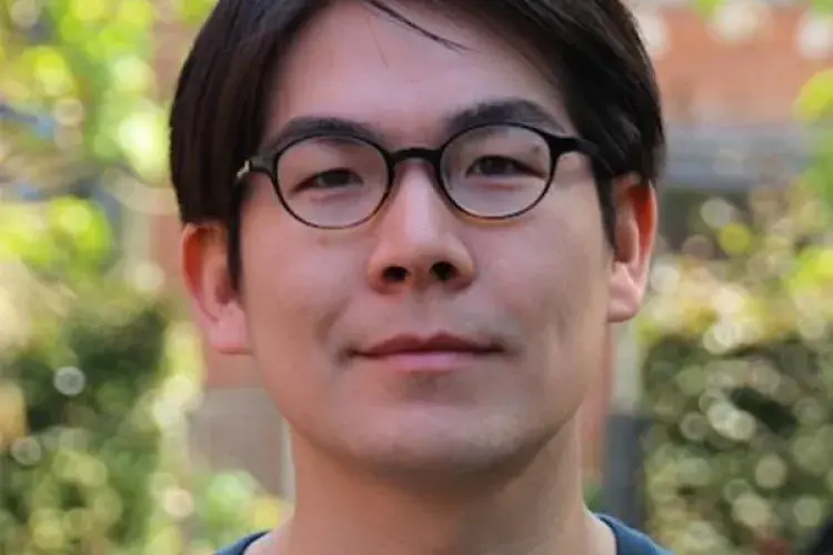 Uegaki Wataru smiling to camera.