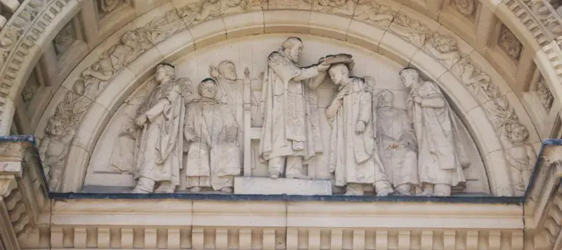 Carving of scholars